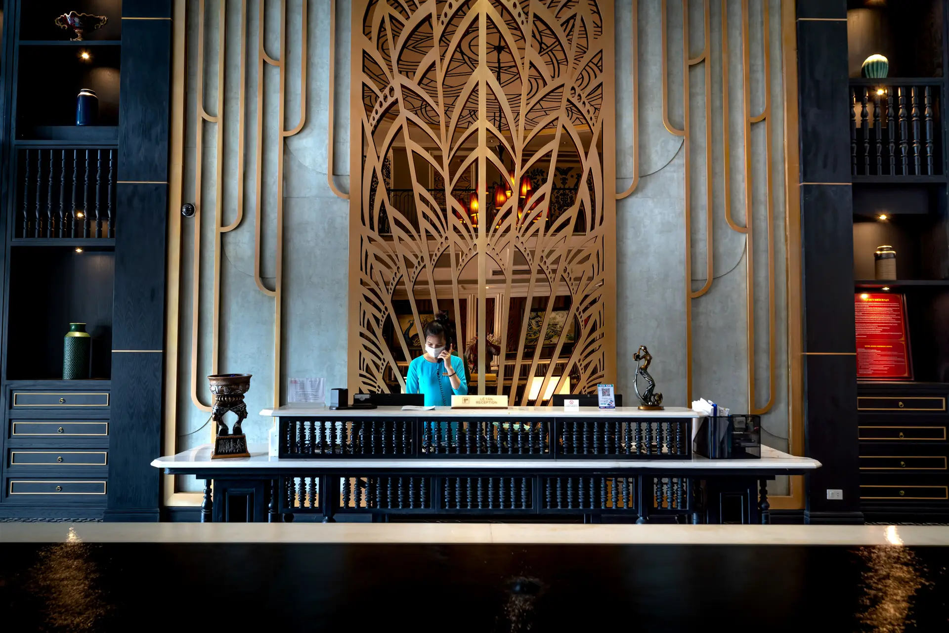 Elegant casino hotel reception desk with professional staff