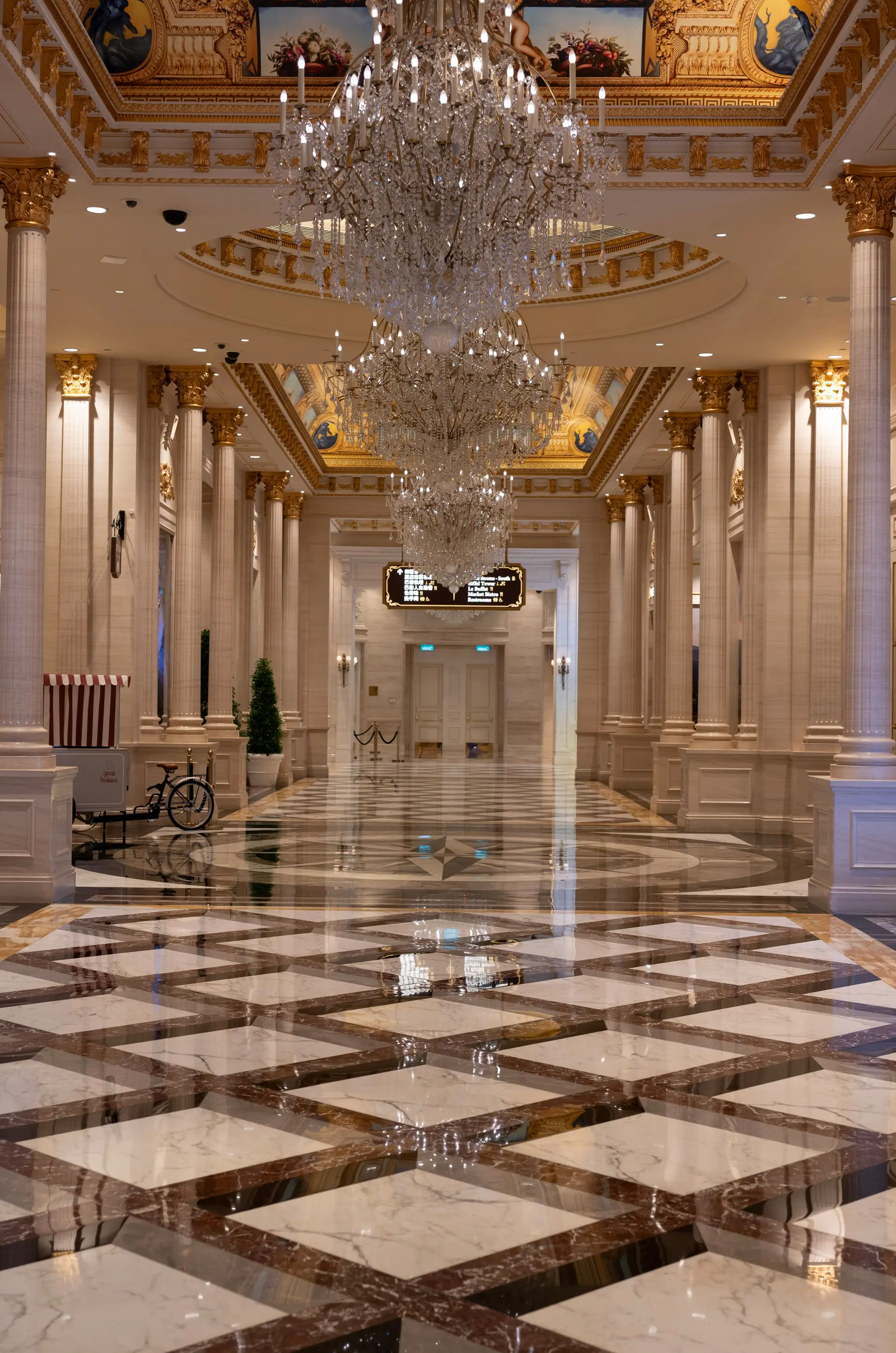 Elegant casino hall with marble floors and architectural lighting
